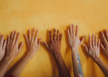 Are the different perspectives and contexts of racism in Singapore at odds?