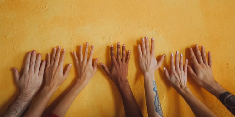 Are the different perspectives and contexts of racism in Singapore at odds?