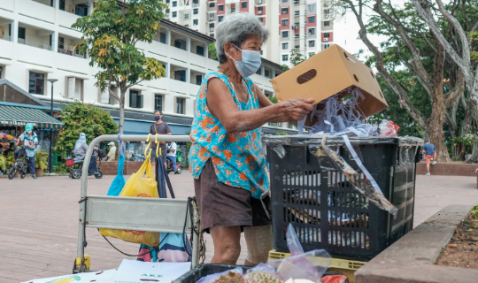 Mdm Ooi relies on stall owners who leave their cardboard waste out for her to collect.