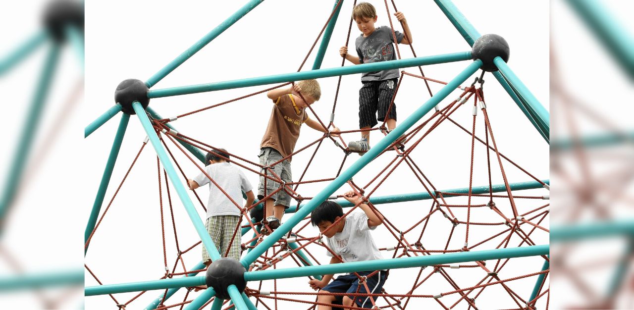 kids playing on rope tower