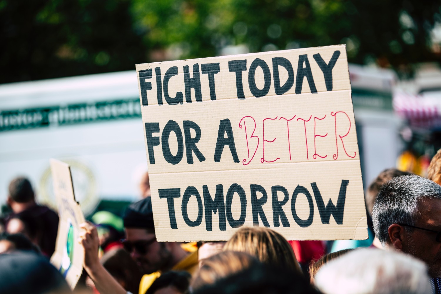 Sign that says "fight today for a better tomorrow"